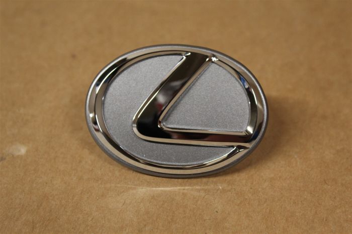 1125820010 Emblem New genuine part | Deutsche Parts