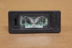 LR087728 Number plate lamp New genuine JLR part