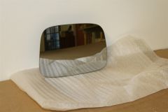VW Caddy / T5 Left UK RHD Manual Mirror Glass 7H2857521M New genuine VW part